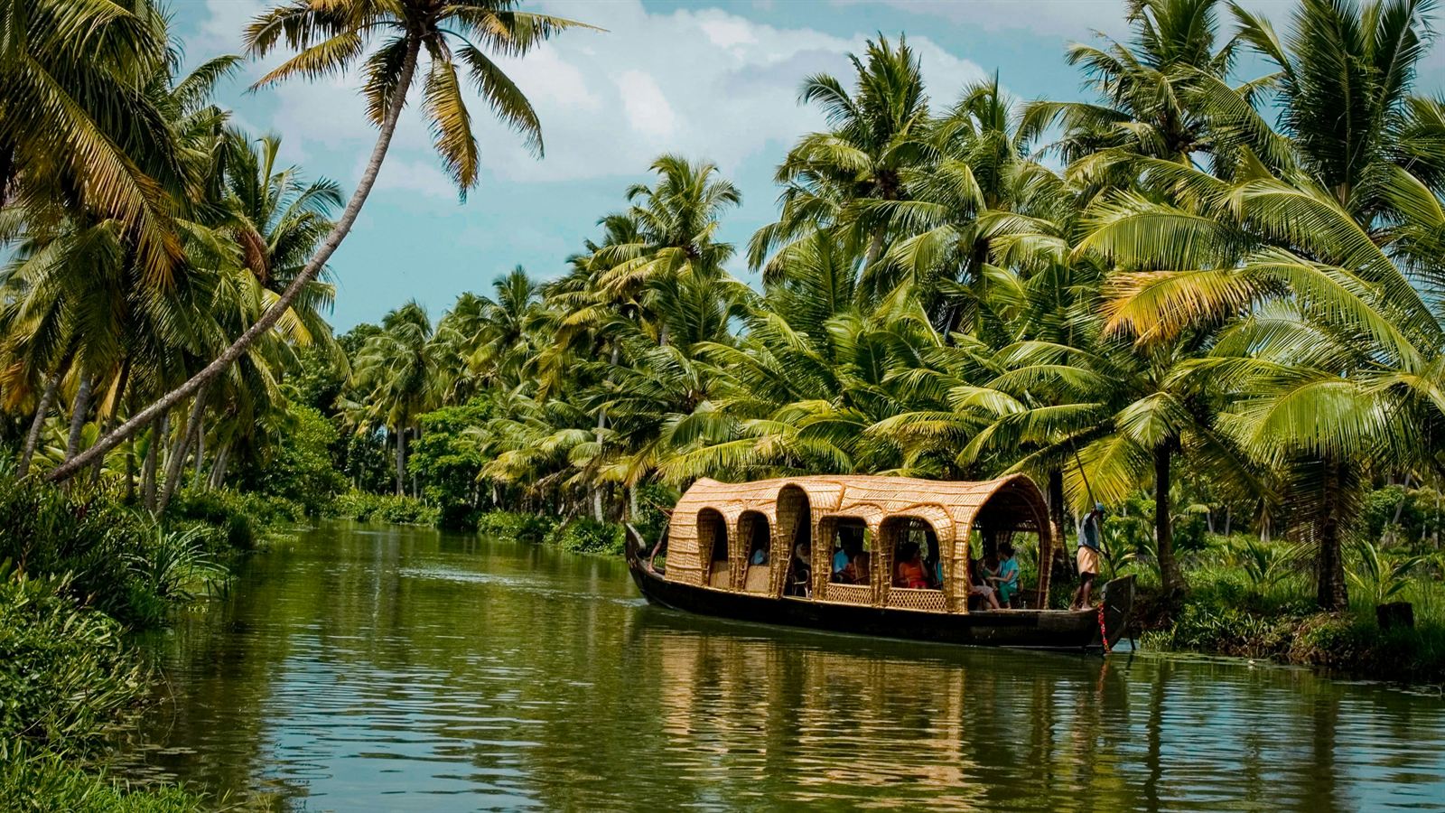 Backwaters of Kerala lined with palms